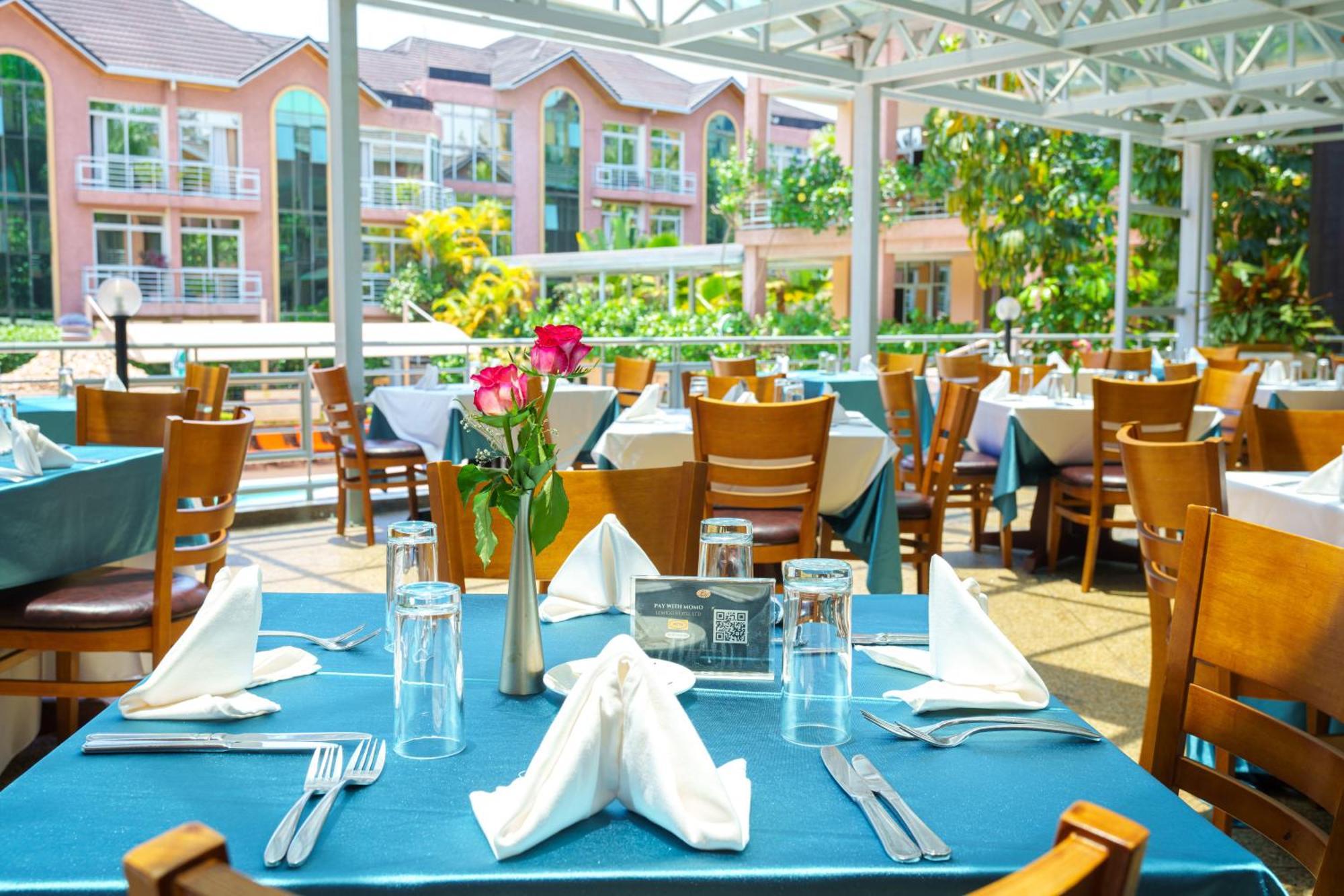Lemigo Hotel Кигали Экстерьер фото
